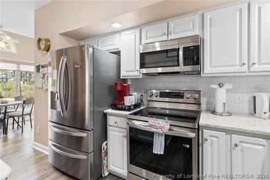 Located in the highly desirable Carolina Trace, this beautifully on Carolina Trace Country Club in North Carolina - for sale on GolfHomes.com, golf home, golf lot