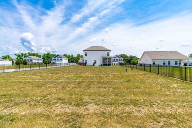 Are you looking for a newer construction home on almost half an on Reedy Creek Golf Course in North Carolina - for sale on GolfHomes.com, golf home, golf lot