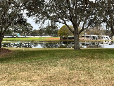 Under contract-accepting backup offers. A must see, this on Plantation Golf Club in Florida - for sale on GolfHomes.com, golf home, golf lot
