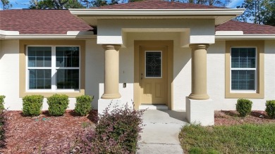 Quality built 3 BR, 2 Bath with a split floor plan, screen porch on Citrus Springs Country Club in Florida - for sale on GolfHomes.com, golf home, golf lot