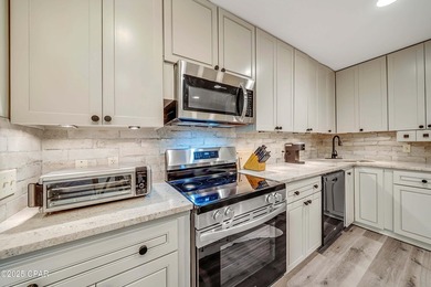 Nobody is above you in this handsome 2nd Story condo with a on Bay Point Resort Golf Club in Florida - for sale on GolfHomes.com, golf home, golf lot