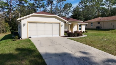 Quality built 3 BR, 2 Bath with a split floor plan, screen porch on Citrus Springs Country Club in Florida - for sale on GolfHomes.com, golf home, golf lot