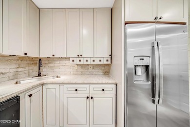 Nobody is above you in this handsome 2nd Story condo with a on Bay Point Resort Golf Club in Florida - for sale on GolfHomes.com, golf home, golf lot