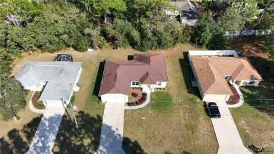 Quality built 3 BR, 2 Bath with a split floor plan, screen porch on Citrus Springs Country Club in Florida - for sale on GolfHomes.com, golf home, golf lot