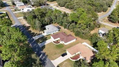 Quality built 3 BR, 2 Bath with a split floor plan, screen porch on Citrus Springs Country Club in Florida - for sale on GolfHomes.com, golf home, golf lot