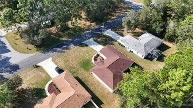 Quality built 3 BR, 2 Bath with a split floor plan, screen porch on Citrus Springs Country Club in Florida - for sale on GolfHomes.com, golf home, golf lot