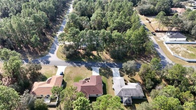 Quality built 3 BR, 2 Bath with a split floor plan, screen porch on Citrus Springs Country Club in Florida - for sale on GolfHomes.com, golf home, golf lot