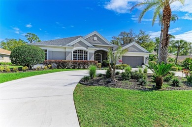 Nestled within a private oasis overlooking a tranquil preserve on River Wilderness Golf and Country Club in Florida - for sale on GolfHomes.com, golf home, golf lot