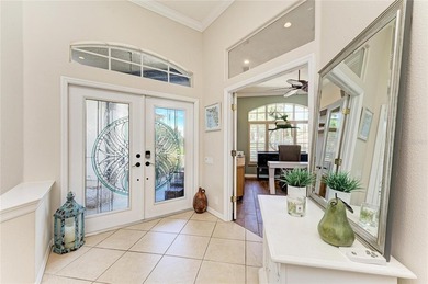 Nestled within a private oasis overlooking a tranquil preserve on River Wilderness Golf and Country Club in Florida - for sale on GolfHomes.com, golf home, golf lot