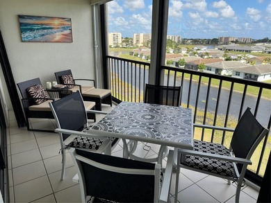 Enjoy your morning coffee on your private balcony, while taking on  in Florida - for sale on GolfHomes.com, golf home, golf lot