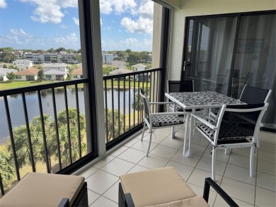 Enjoy your morning coffee on your private balcony, while taking on  in Florida - for sale on GolfHomes.com, golf home, golf lot
