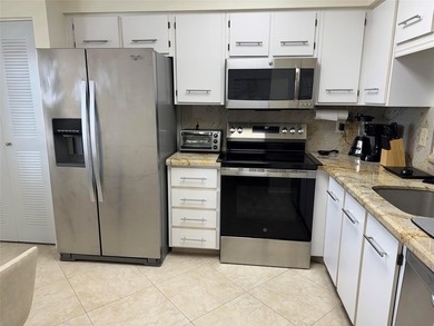 Enjoy your morning coffee on your private balcony, while taking on  in Florida - for sale on GolfHomes.com, golf home, golf lot