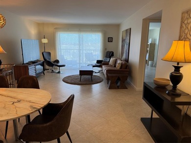 Enjoy your morning coffee on your private balcony, while taking on  in Florida - for sale on GolfHomes.com, golf home, golf lot