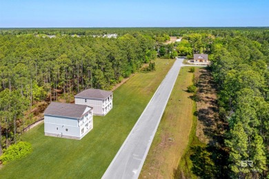 BUILDER WILL INCLUDE REFRIGERATOR AND BLINDS FOR ANY BUYER WHO on The Golf Club of the Wharf in Alabama - for sale on GolfHomes.com, golf home, golf lot