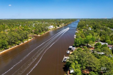 BUILDER WILL INCLUDE REFRIGERATOR AND BLINDS FOR ANY BUYER WHO on The Golf Club of the Wharf in Alabama - for sale on GolfHomes.com, golf home, golf lot