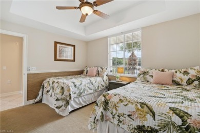 Take in the Florida sunshine with this 3 bed 2 bath end unit on Pelican Sound Golf and River Club in Florida - for sale on GolfHomes.com, golf home, golf lot