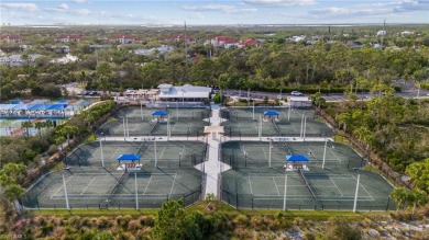 Take in the Florida sunshine with this 3 bed 2 bath end unit on Pelican Sound Golf and River Club in Florida - for sale on GolfHomes.com, golf home, golf lot