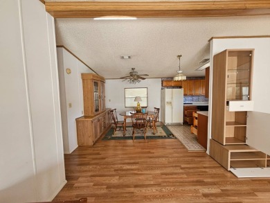 This home is on leased land in Cypress Lakes Village (a 55+ on Big Cypress Golf and Country Club in Florida - for sale on GolfHomes.com, golf home, golf lot