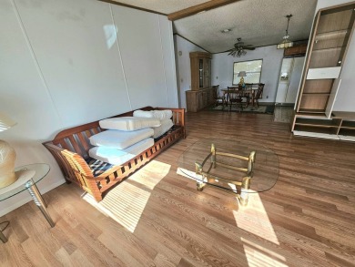 This home is on leased land in Cypress Lakes Village (a 55+ on Big Cypress Golf and Country Club in Florida - for sale on GolfHomes.com, golf home, golf lot