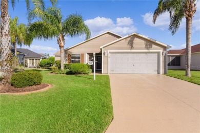 PRICE REDUCTION! This beautifully landscaped 3/2 AT EASE model on Yankee Clipper Executive Golf Course in Florida - for sale on GolfHomes.com, golf home, golf lot