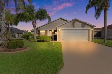 PRICE REDUCTION! This beautifully landscaped 3/2 AT EASE model on Yankee Clipper Executive Golf Course in Florida - for sale on GolfHomes.com, golf home, golf lot