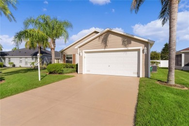 PRICE REDUCTION! This beautifully landscaped 3/2 AT EASE model on Yankee Clipper Executive Golf Course in Florida - for sale on GolfHomes.com, golf home, golf lot