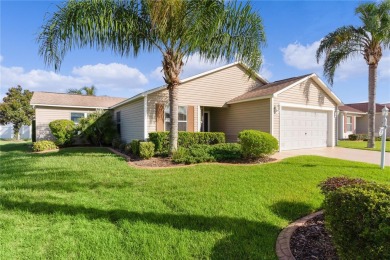 PRICE REDUCTION! This beautifully landscaped 3/2 AT EASE model on Yankee Clipper Executive Golf Course in Florida - for sale on GolfHomes.com, golf home, golf lot