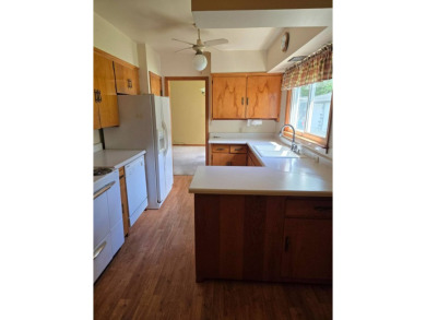 Discover charm and comfort in this 2 bedroom, 1 bath ranch style on Quail Creek Country Club in Illinois - for sale on GolfHomes.com, golf home, golf lot