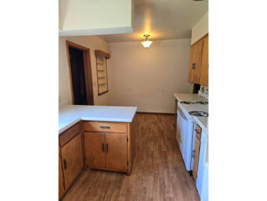 Discover charm and comfort in this 2 bedroom, 1 bath ranch style on Quail Creek Country Club in Illinois - for sale on GolfHomes.com, golf home, golf lot