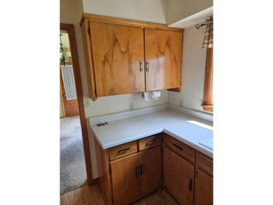 Discover charm and comfort in this 2 bedroom, 1 bath ranch style on Quail Creek Country Club in Illinois - for sale on GolfHomes.com, golf home, golf lot