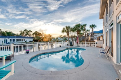 Tucked behind the private gates of the Bay Point community, this on Bay Point Resort Golf Club in Florida - for sale on GolfHomes.com, golf home, golf lot
