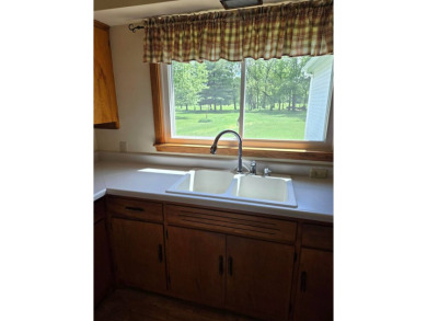 Discover charm and comfort in this 2 bedroom, 1 bath ranch style on Quail Creek Country Club in Illinois - for sale on GolfHomes.com, golf home, golf lot