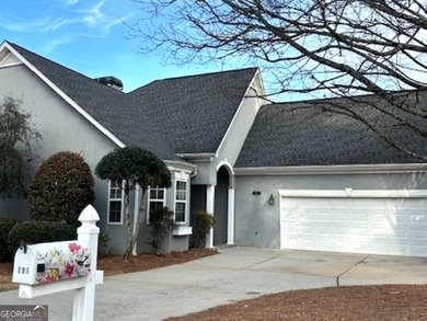 Welcome Home! Charming ranch plan with airy 2-story foyer in on Canongate At Flat Creek Club in Georgia - for sale on GolfHomes.com, golf home, golf lot