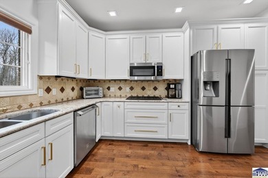 Nestled in the wooded beauty of Idle Creek Golf Community, this on Idle Creek Golf Course in Indiana - for sale on GolfHomes.com, golf home, golf lot