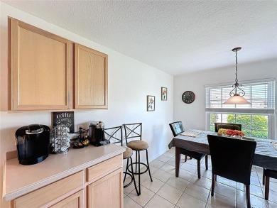 Charming 2/2 + Den RidgeCrest Model Just Steps from High Vista on Ridgewood Lakes Golf and Country Club in Florida - for sale on GolfHomes.com, golf home, golf lot