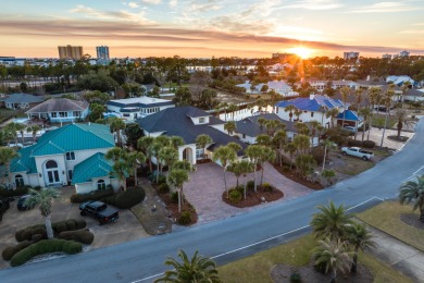 Tucked behind the private gates of the Bay Point community, this on Bay Point Resort Golf Club in Florida - for sale on GolfHomes.com, golf home, golf lot