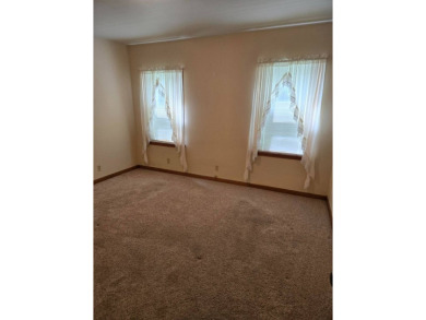 Discover charm and comfort in this 2 bedroom, 1 bath ranch style on Quail Creek Country Club in Illinois - for sale on GolfHomes.com, golf home, golf lot
