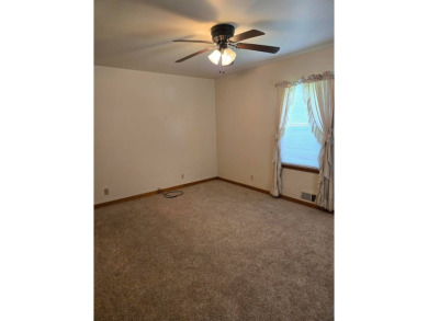 Discover charm and comfort in this 2 bedroom, 1 bath ranch style on Quail Creek Country Club in Illinois - for sale on GolfHomes.com, golf home, golf lot