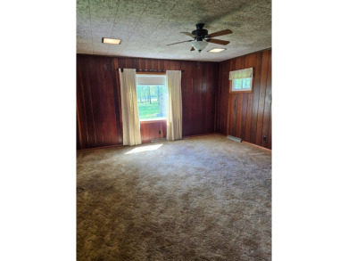 Discover charm and comfort in this 2 bedroom, 1 bath ranch style on Quail Creek Country Club in Illinois - for sale on GolfHomes.com, golf home, golf lot