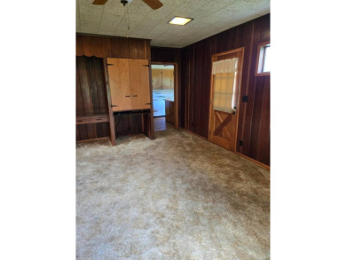 Discover charm and comfort in this 2 bedroom, 1 bath ranch style on Quail Creek Country Club in Illinois - for sale on GolfHomes.com, golf home, golf lot