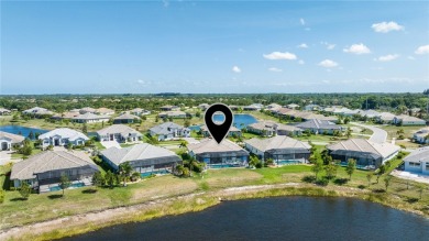 Timeless 2022-built pool home that overlooks the tranquil lake on Bent Pine Golf Club in Florida - for sale on GolfHomes.com, golf home, golf lot