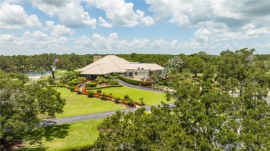 Timeless 2022-built pool home that overlooks the tranquil lake on Bent Pine Golf Club in Florida - for sale on GolfHomes.com, golf home, golf lot