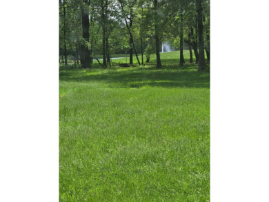 Discover charm and comfort in this 2 bedroom, 1 bath ranch style on Quail Creek Country Club in Illinois - for sale on GolfHomes.com, golf home, golf lot