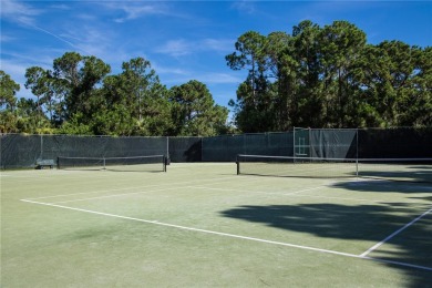 Timeless 2022-built pool home that overlooks the tranquil lake on Bent Pine Golf Club in Florida - for sale on GolfHomes.com, golf home, golf lot