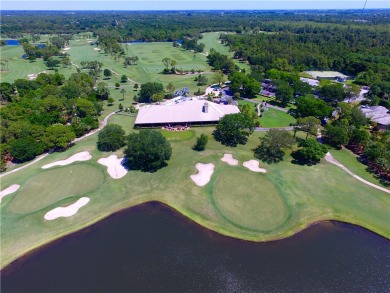 Timeless 2022-built pool home that overlooks the tranquil lake on Bent Pine Golf Club in Florida - for sale on GolfHomes.com, golf home, golf lot