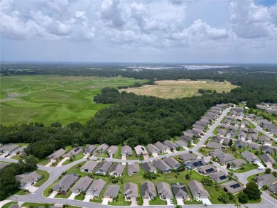 Charming 2/2 + Den RidgeCrest Model Just Steps from High Vista on Ridgewood Lakes Golf and Country Club in Florida - for sale on GolfHomes.com, golf home, golf lot