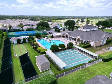 Under contract-accepting backup offers. Charming 2/2 + Den on Ridgewood Lakes Golf and Country Club in Florida - for sale on GolfHomes.com, golf home, golf lot