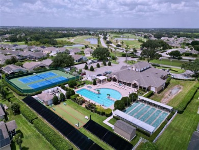 Under contract-accepting backup offers. Charming 2/2 + Den on Ridgewood Lakes Golf and Country Club in Florida - for sale on GolfHomes.com, golf home, golf lot