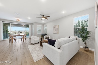 Situated on Hole 14, this beautifully upgraded home showcases on Verrado Golf Club - Victory in Arizona - for sale on GolfHomes.com, golf home, golf lot