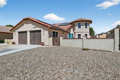 Welcome to 14702 Robin Ln, a spacious 4-bedroom, 2-bath home on Silver Lakes Golf Course in California - for sale on GolfHomes.com, golf home, golf lot